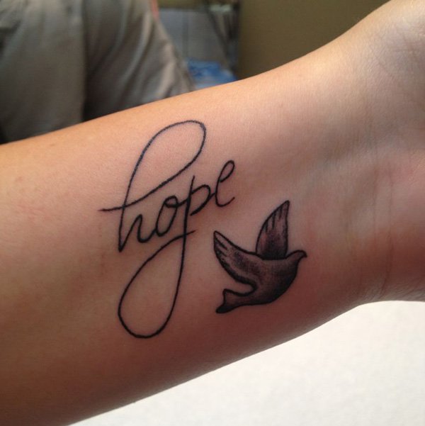 Hope Grey Ink Flying Dove Tattoo On Wrist