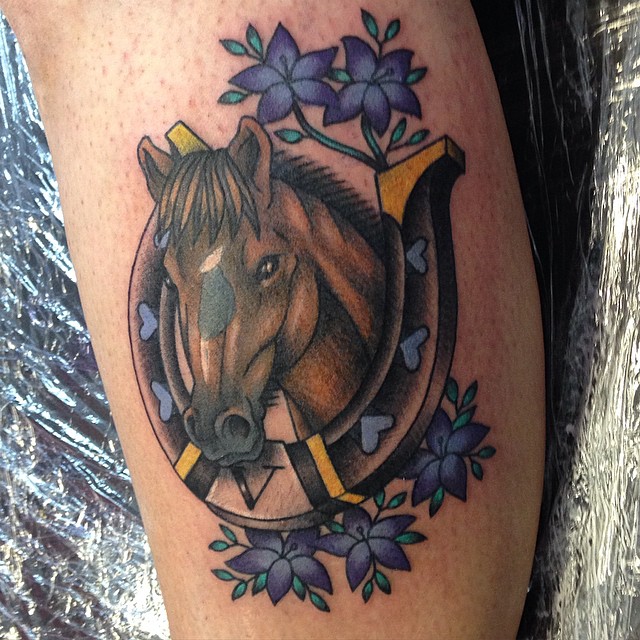 Horseshoe And Horse Head With Purple Flowers Tattoo