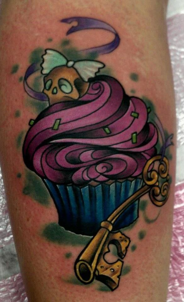 Key And Sugar Skull Cupcake Tattoo On Leg