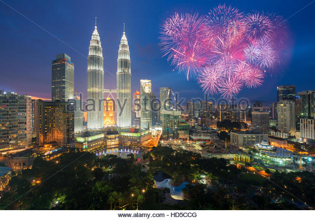 Kuala Lumpur Twin Towers And Other Skyline With Fireworks During Hari Merdeka Celebration