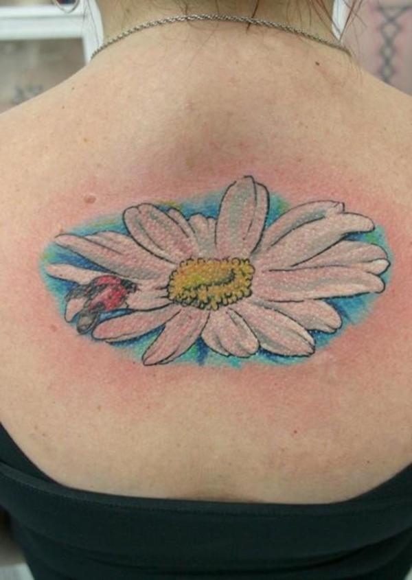 Ladybug On Daisy Flower Tattoo On Upper Back