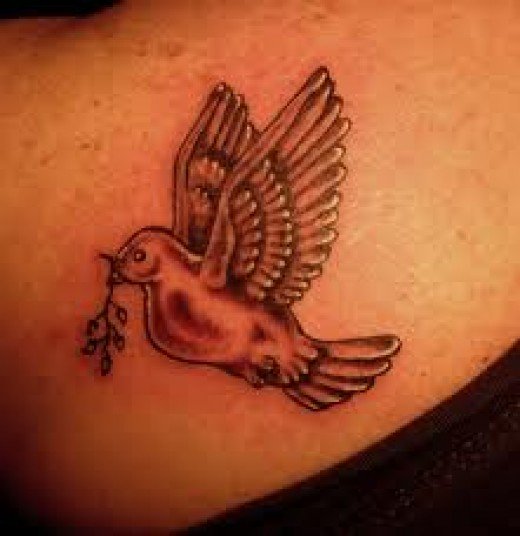 Left Back Shoulder Flying Dove Tattoo