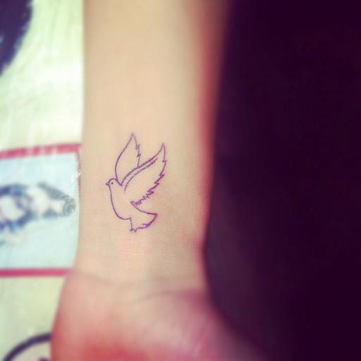 Left Wrist Outline Dove Tattoo