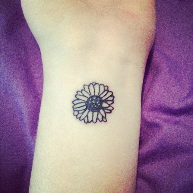 Left Wrist Small Daisy Tattoo On Wrist