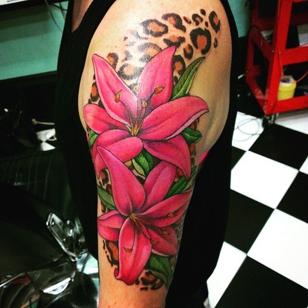 Leopard Print And Lily Flowers Tattoo On Left Half Sleeve