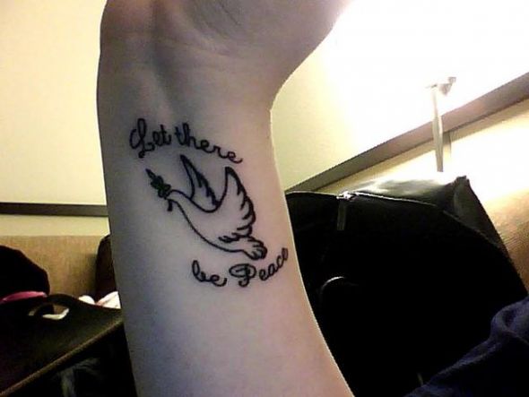 Let There Be Peace Dove Tattoo On Wrist