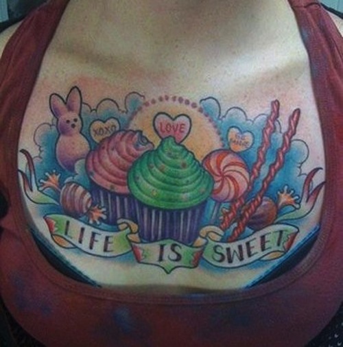 Life Is Sweet Candies And Cupcake Tattoos On Girl Chest