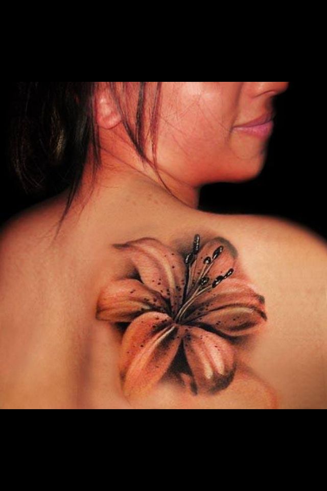 Lily Flower Tattoo On Girl Back Shoulder