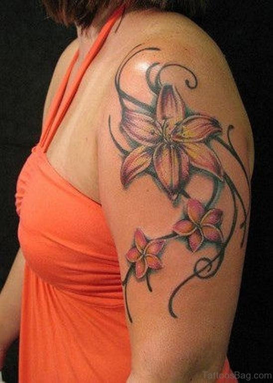 Lily Flower Tattoo On Left Shoulder