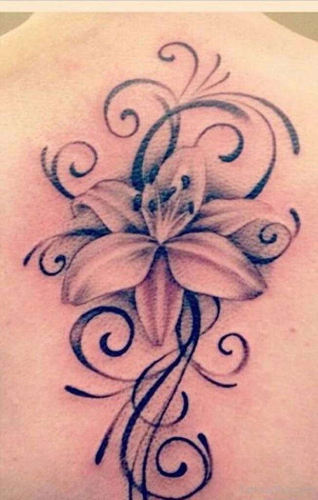 Lily Flower Tattoo On Upper BAck