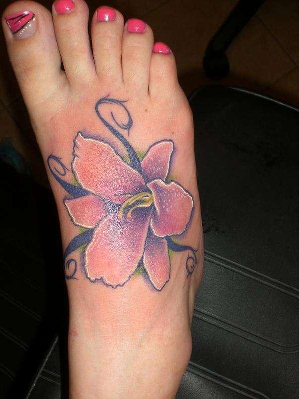 Lily Tattoo On Right Foot