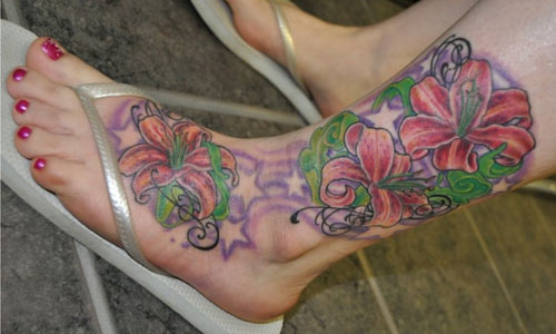 Lily Tattoos On Left Foot And Leg