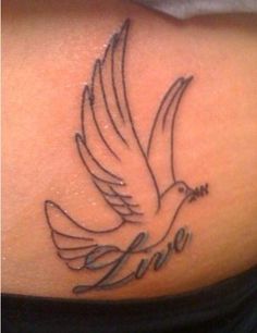 Live Dove Tattoo On Lower Back