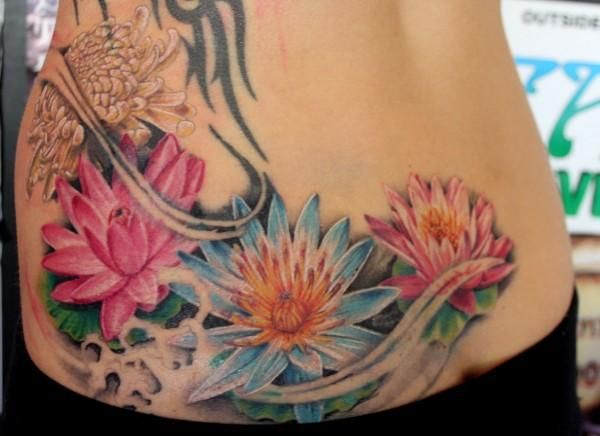 Lotus And Realistic Lily Tattoos On Lower Back