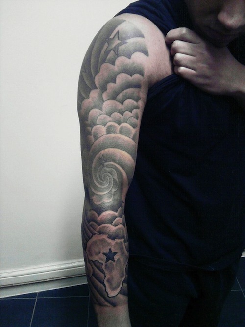 Man With Full Sleeve Clouds Tattoos