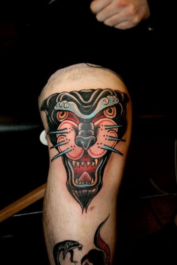 Man With Traditional Panther Head Tattoo On Leg