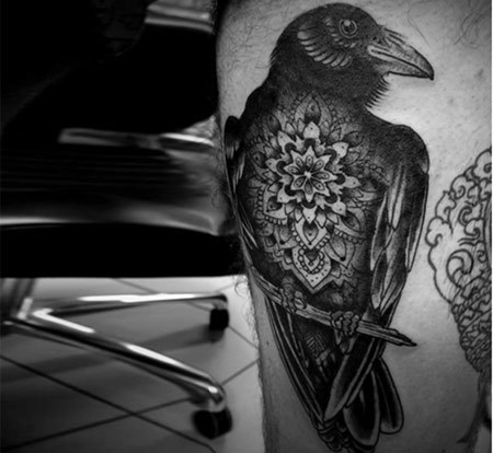Mandala Flower In Raven Tattoo On Leg