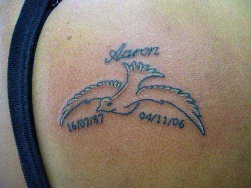 Memorial Dove Tattoo On Right back Shoulder