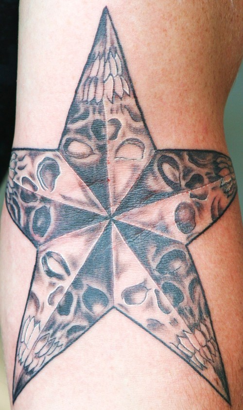 Nautical Star With Skulls Tattoo On Arm