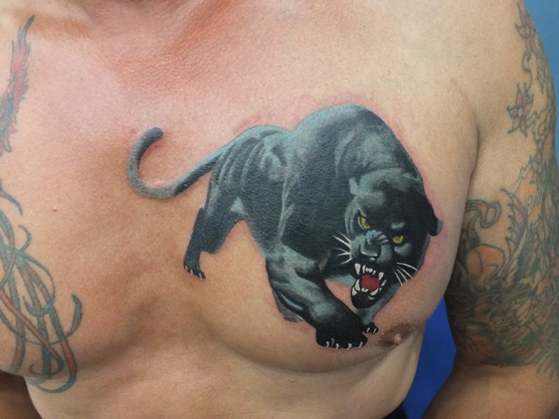Nice Angry Panther Head Tattoo On Man Chest