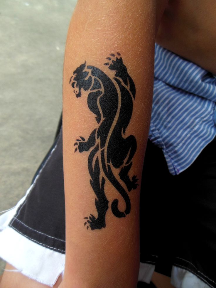 Nice Black Tribal Panther Tattoo On Arm Sleeve