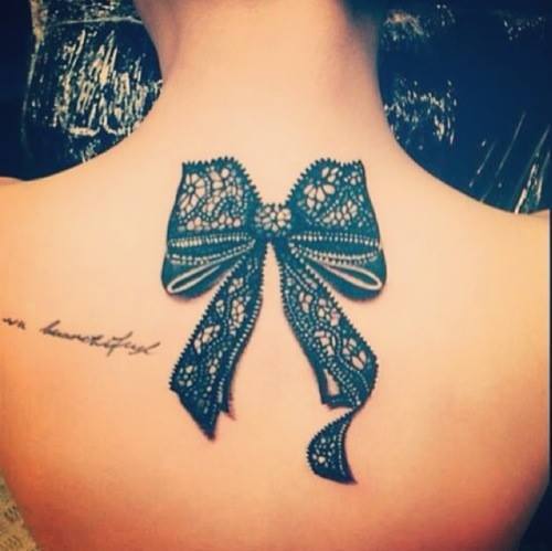 Nice Bow Lace Tattoo On Girl Upper Back