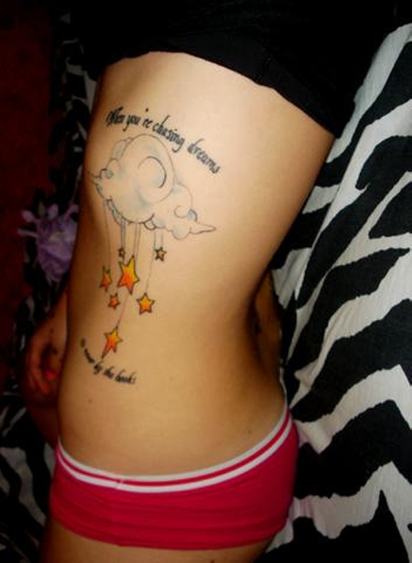 Nice Color Stars And Clouds Tattoo On Rib Side