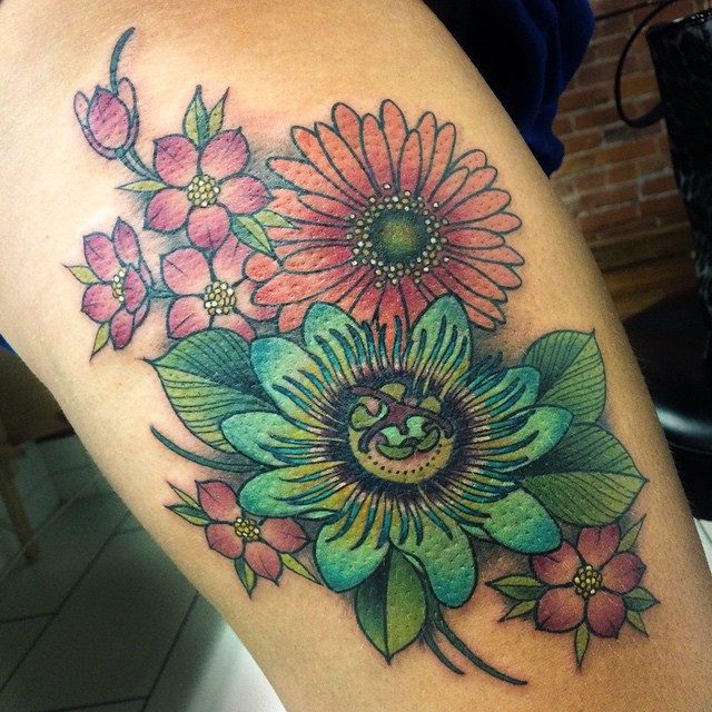 Nice Colored Daisy Flower Tattoo On Arm