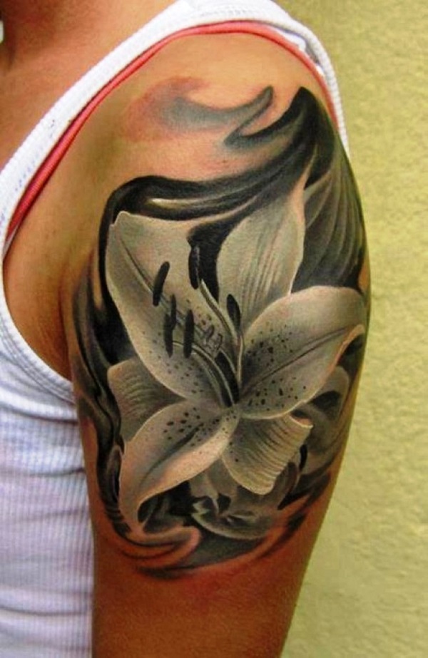 Nice Grey Lily Flower Tattoo On Left Shoulder