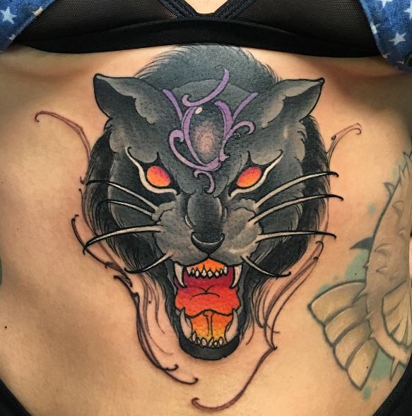 Orange Eyes Panther Tattoo On Girl Stomach