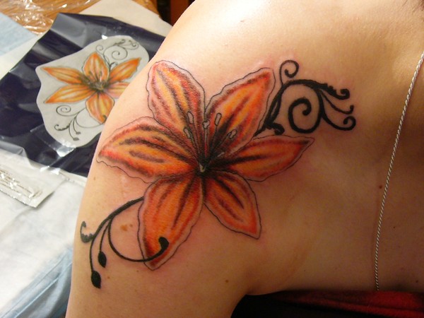 Orange Lily Flower Tattoo On Shoulder