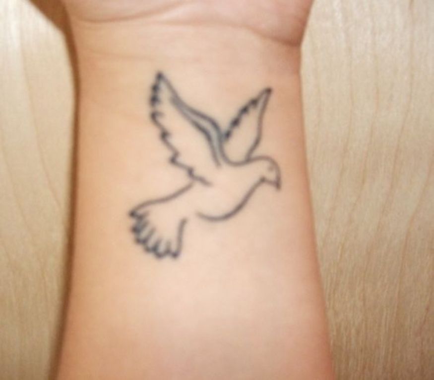 Outline Small Dove Tattoo On Left Wrist