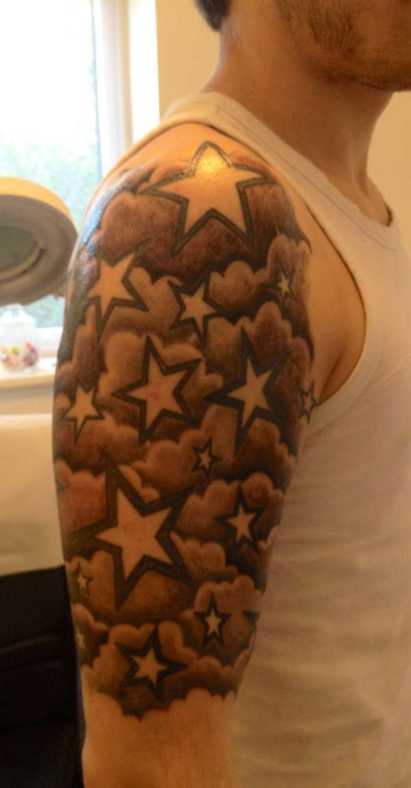Outline Stars And Clouds Tattoo On Right Half Sleeve