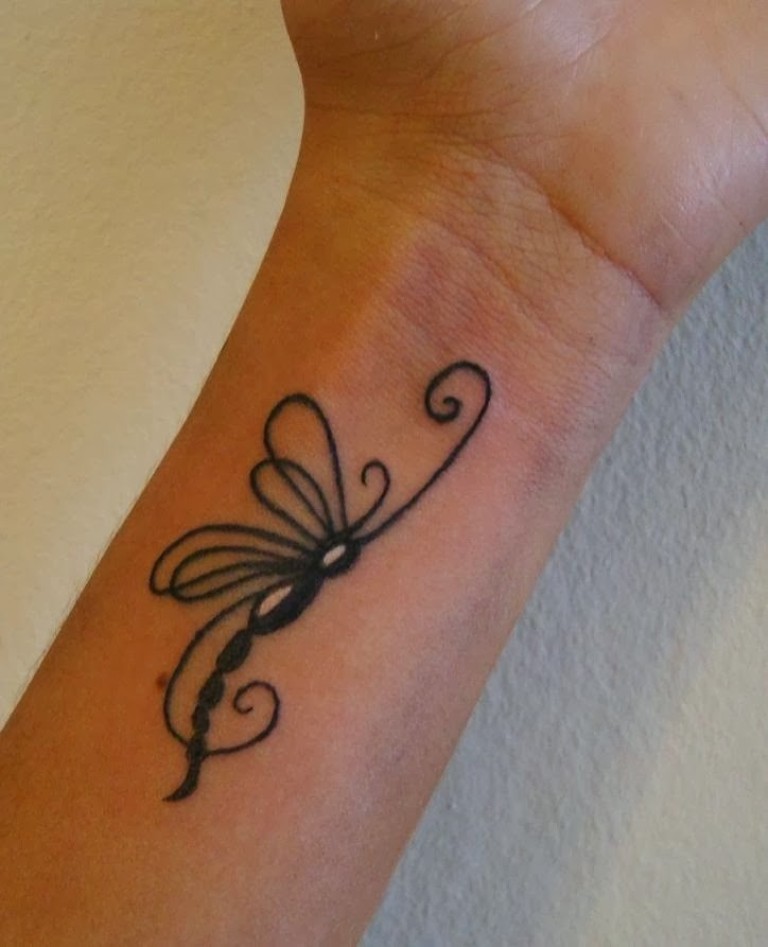 Outline Tribal Dragonfly Tattoo On Left Forearm