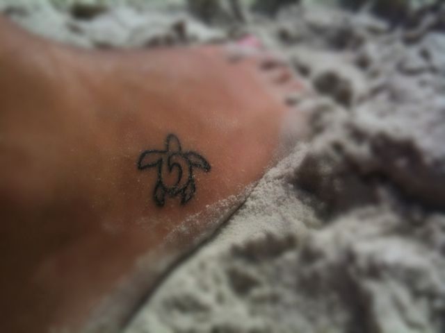 Outline Tribal Turtle Tattoo On Right Foot