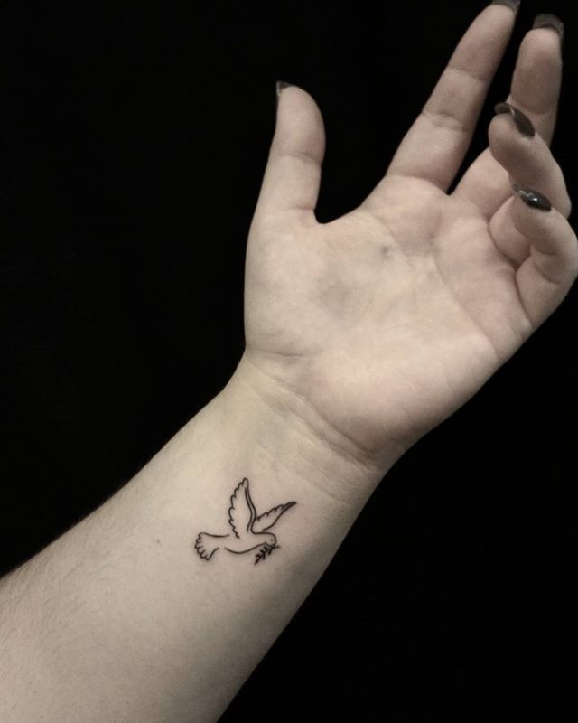Peace Dove Tattoo On Left Wrist