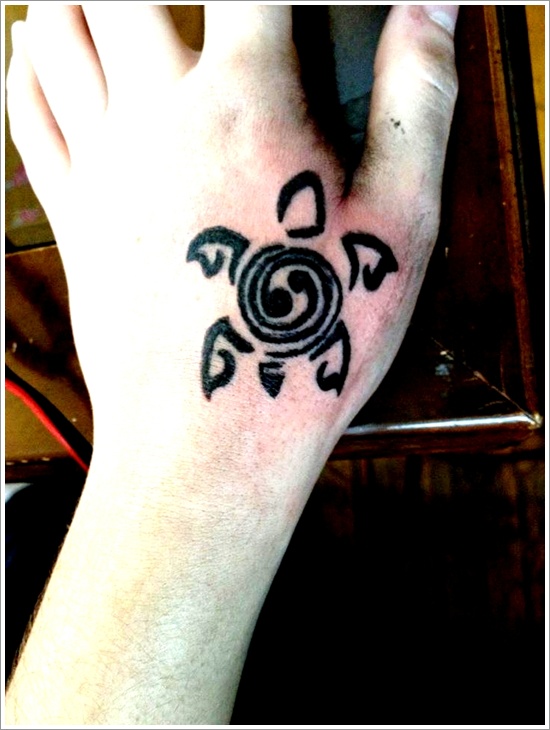 Peace Turtle Tattoo On Girl Left Hand
