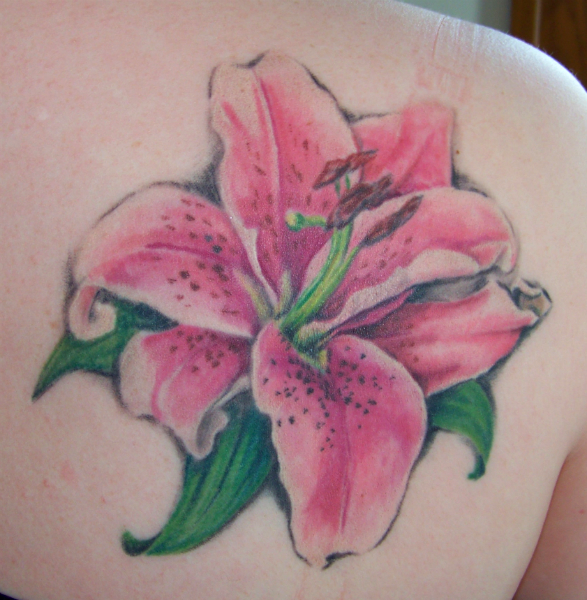 Pink And White Ink Lily Flower Tattoo On Right Back Shoulder