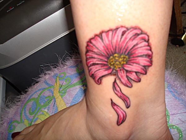 Pink Daisy Flower Tattoo On Girl Side Leg