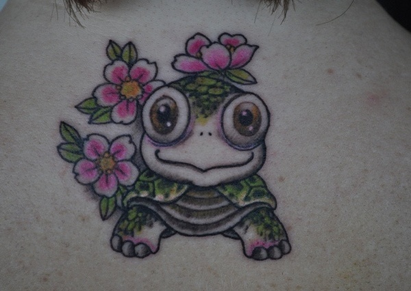 Pink Flowers And Green Turtle Tattoo On Girl Back