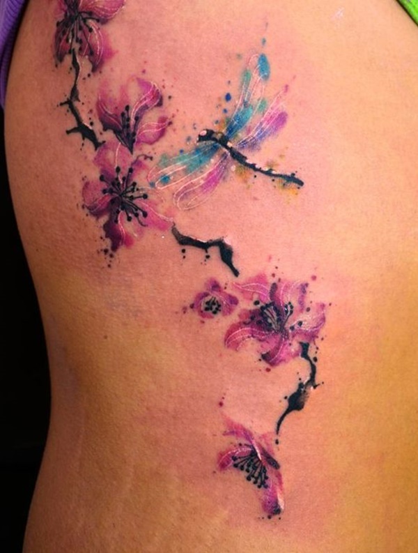 Pink Flowers And Watercolor Dragonfly Tattoo On Side Rib