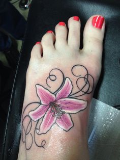 Pink Lily Flower Tattoo On Girl Left Foot