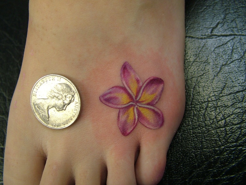 Pink Small Lily Tattoo On Left Foot