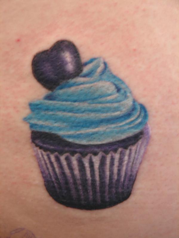 Purple And Blue Realistic Cupcake Tattoo