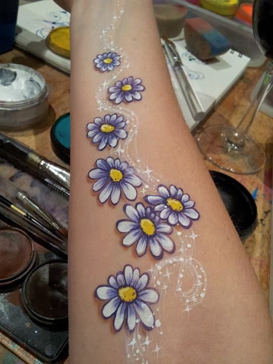 Purple And White Ink Daisy Flowers Tattoos On Right Forearm