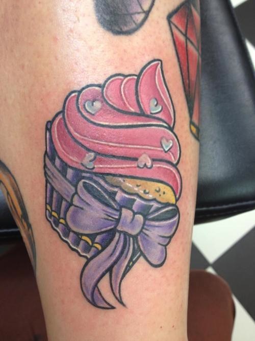 Purple Bow With Simple Cupcake Tattoo