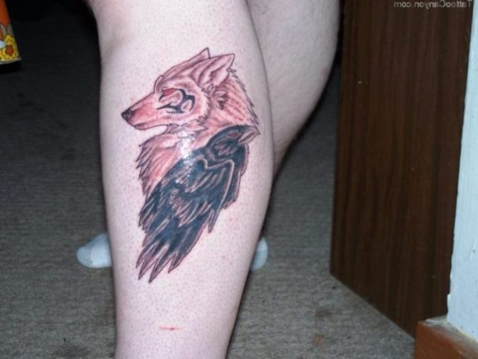 Raven And Wolf Head Tattoo On Side Leg