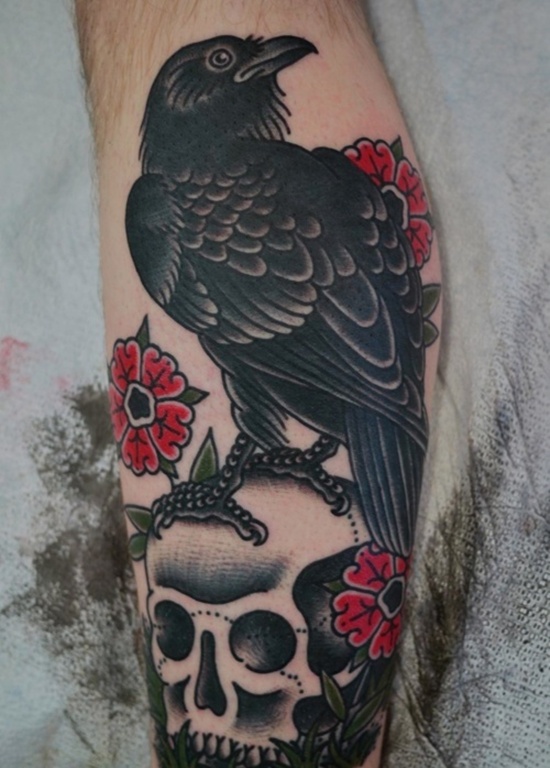 Raven Sit On Skull With Red Flowers Tattoo On Side Leg