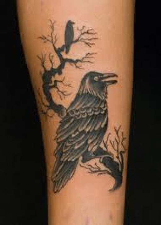 Raven Sit on Tree Tattoo On Arm Sleeve