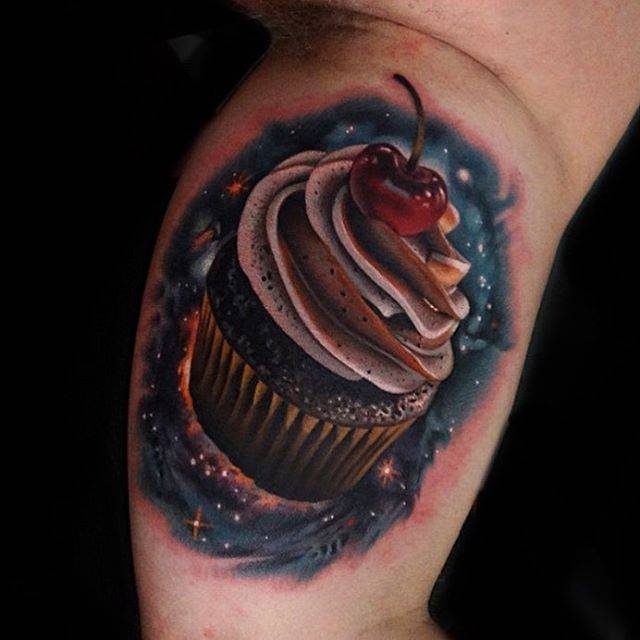 Realistic Cupcake Tattoo On Inner Bicep